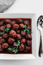 Bourbon meatballs in a crockpot is a simple appetizer, pot luck dish, and party food. This Bourbon Meatballs Recipe Is A Party Food Staple Celebrations At Home
