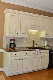 painting kitchen cabinets antique white