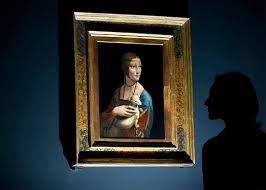 La peinture représente la tête d'une femme aux cheveux ébouriffés , esquissé avec des cadres de violon. La Dame A L Hermine De Leonard De Vinci Au Musee National De Cracovie