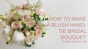 Look through magazines, books on floral decorating, visit fine floral shops, and take pictures of floral arrangements you like in flowers for the fitting: How To Make A Blush Bridal Bouquet With Garden Roses And Peonies Wholesale Flowers Direct Youtube