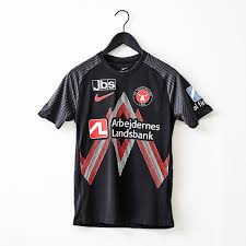 The shirt is accompanied by dark green shorts and socks. Fc Midtjylland 2021 22 Nike Home Shirt 21 22 Kits Football Shirt Blog