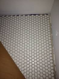 Love The Look Of This Penny Tile With Dark Grout Penny Tile Tile Bathroom Bathroom Flooring
