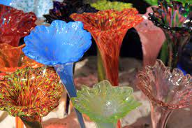 The holder on the back of the flower allows you to display it multiple ways: Pictures Of 50 Jaw Dropping Blown Glass Flowers Home Stratosphere
