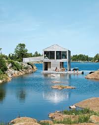 Maybe you would like to learn more about one of these? Floating House With An Integrated Boathouse And Dock