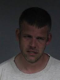 John Chiv: Rob Christensen charged with resisting an officer and  tresspassing