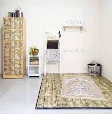 Bisa pakai sofa tanpa kaki begini misalnya. Dari Hati Ibu Tip Dekorasi Ruang Solat Selesa