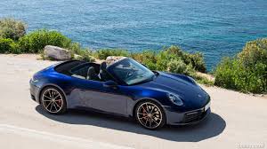 Detailed specs and features for the 2021 porsche 911 including dimensions, horsepower, engine, capacity, fuel economy, transmission, engine type, cylinders, drivetrain and more. 2020 Porsche 911 Carrera 4s Cabriolet Color Gentian Blue Metallic Front Three Quarter Hd Wallpaper 35