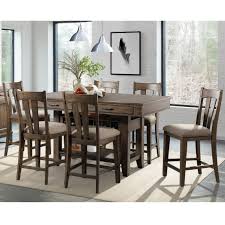 It can be a great choice for a kitchen and can be used to help extend your workspace. Intercon Whiskey River Rustic 7 Piece Counter Height Dining Set With Wine Storage Wilson S Furniture Pub Table And Stool Sets