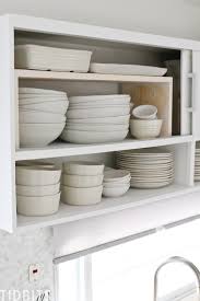 Every home looks better with shelving. Easy Diy Cabinet Shelf Risers Tidbits