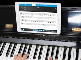 Well, there's an app for that. Ipad App Piano Marvel