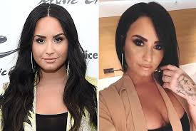 The haircut it just past lovato's shoulders, which is significantly shorter than her normal, long locks. Demi Lovado S Haircut New Bob Look Before And After People Com