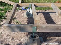 Attach Wood Shed Joists To Beam See How To Http Www Usa Gardening Com Wood Shed Wood Shed 2 Html Wood Shed Firewood Shed Simple Shed
