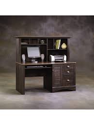 A home computer desk usually has basic features such as a slideout for a keyboard and a bottom section to hold a desktop computer. Sauder Harbor View Collection Computer Desk With Hutch Antiqued Paint Office Depot