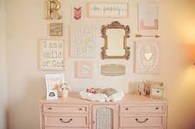 Collage Wall In Baby Girl S Nursery Gorgeous Painted Dresser By Sibling Salvage And Madolly S Nursery Wall Decor Girl Baby Girl Room Girl Nursery