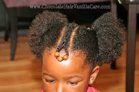 Two Puffs And A Cornrow Chocolate Hair Vanilla Care Natural Hair Styles Little Girl Hairstyles Kids Hairstyles