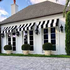 Nothing Like Black And White Brick Exterior House House Awnings White Brick House Exterior