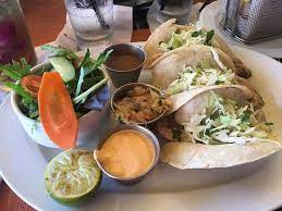 Maybe you would like to learn more about one of these? Great Mai Tai And Fish Tacos And The View Is Pretty Spectacular Too Service Was Good And Frien Picture Of Tropics Bar Grill Honolulu Tripadvisor