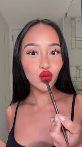 Trying the Beetlejuice Lips Trend with Orange Lipstick