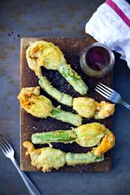 Before you eat them, the flowers need to be gently washed under cold water and pat dry. Deep Fried Courgette Flowers Stuffed With Goats Cheese And Lavender Honey Eat Appetizer Recipes Food