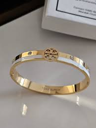 Tory white/gold bangle