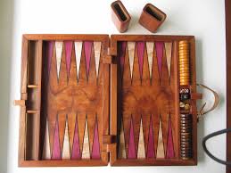 Backgammon matches can last a long time, and you are continually throwing dice and moving around the pieces. Custom Koa Inlaid Backgammon Set By Creative Artistry And Design Custommade Com