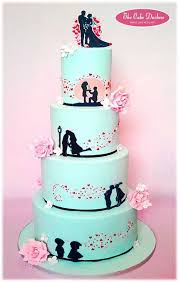 Lovely Engagement Cake Telling The Story Of The Couple Silhouette Cake Unique Wedding Cakes Traditional Wedding Cakes