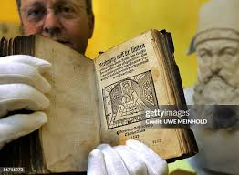 Rainer Gebhardt, chairman of the Adam Ries Society, presents... News Photo 