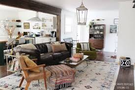 My modern farmhouse style can best be described as cozy and inviting with old farmhouse floors and lots of moulding and trim, but with a modern spin on the furniture we used to decorate each room. Happy Anniversary White Buffalo Thewhitebuffalostylingco Com Mid Century Modern Living Room Design Mid Century Modern Living Room Decor Farm House Living Room