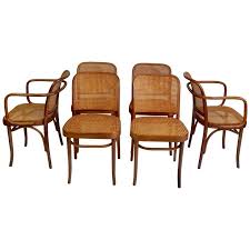 The chairs have a rich dark finish and feature a bentwood back with a round seat supported by a ring stretcher. Bistro Chairs Boho Cane Chairs Bentwood Chairs Thonet Style Chairs Josef Hoffmann Chairs Vintage Cane Chairs Polish Chairs Bohemian Dining Chairs Home Living Lifepharmafze Com