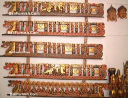 At the center of the composition are the seven chakras, each depicted within a colorful flower. Bali Carvings Traditional Balinese Wooden Wall Panel Decoration