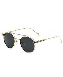 Les lunettes de soleil rondes adoucissent les traits des visages plutôt rectangulaires et carrés grâce à ses courbes. Lunettes Soleil Double Pont Doree Noir