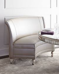 Discreet seating areas are created with curved upholstered banquettes in black colored fabric, covered with gold silk velvets. Banquettes Benches At Horchow