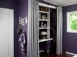 A shade of purple so dark that it may almost be confused with black. Dark Purple Room With Lavender Curtains And Ample Closet Space Hgtv