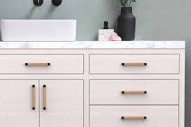 The bar pull collection's distinctive angles are a subtle masterpiece for any kitchen or bathroom cabinet. Emtek Select Cabinet Pull Rectangular Stem Knurled Bar Emtek Products Inc