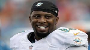 Miami Dolphins arrive in London, but without Randy Starks, Chris McCain