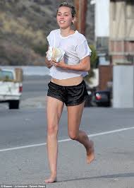Compare her height, weight, body measurements, religion, sexual orientation with other celebs. Miley Cyrus Goes Barefoot To Pick Up A Post Hike Coconut Drink Daily Mail Online