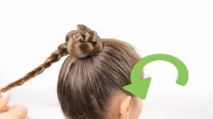 Pull hair to the front to avoid a smooth ponytail look. 6 Ways To Make A Bun Wikihow
