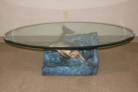From an edition of 250. Lot Robert Wyland Aquatic Dolphin Experience Bronze Table