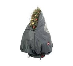 Decorated Upright Tree Storage Bag With Rolling Tree Stand In 2021 Christmas Tree Storage Bag Christmas Tree Storage Tree Storage Bag