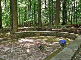 Place wood decks and add a fire pit in the middle. Natural Wooded Spaces Rustic Patio Cleveland By Thompson Landscape Design And Installation Houzz Nz