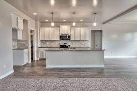 Get quality northern maple kitchen cabinets in minnesota, usa from gec cabinet depot at affordable prices. Huge Kitchen With Merillat Spring Valley Maple Cotton Cabinets Wood Corbels Under The Raised Breakfas Wood Laminate Flooring Huge Kitchen Kitchen Flooring