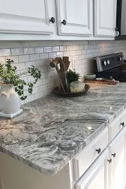 Backsplash Black And White Granite Countertops Corian Or Granite 10 Important Differences Cheap Kitchen Countertops Farmhouse Kitchen Backsplash Kitchen Remodel Countertops