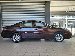 Image result for Dark Garnet Red 2002 Caravan