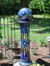 I am so excited to finish my first bowling ball mosaic, becky norris exclaims! Garden Orbs And Gazing Balls In The Garden Flea Market Gardening