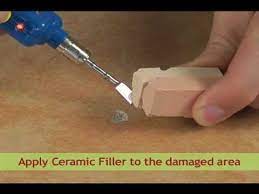 How do i fix ceramic tile that have a large ceramic chipped off. How To Repair A Hole Or Chip In A Tile Youtube