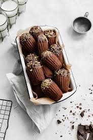 Browse the user profile and get inspired. Chocolate Dipped Chocolate Madeleines Broma Bakery