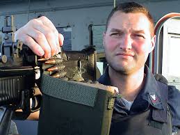 US Navy Quartermaster 3rd class Steven Harmon stands USS INGRAHAM's (FFG  61) Defense and Action Team (DART) watch to protect Ingraham from hostile  units. Ingraham is patrolling the Arabian Sea in support