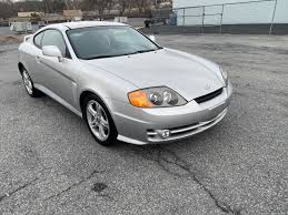 Image result for Bright Silver 2000 Tiburon