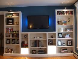 Simple And Clever Transformation Of The Ikea Billy Bookshelves By Modifing And Adding Trim And Lighting Get A Custo Ikea Bookcase Ikea Bookshelves Home Decor