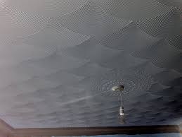 In this case, the texture is applied with a trowel with teeth. Fan Drywall Texture Artex Comb Pattern Created On A Ceiling Ceiling Texture Ceiling Texture Types Ceiling Design Bedroom